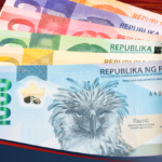 A photo of Peso bills from a wallet, depicting bank transfer to Cebuana transactions