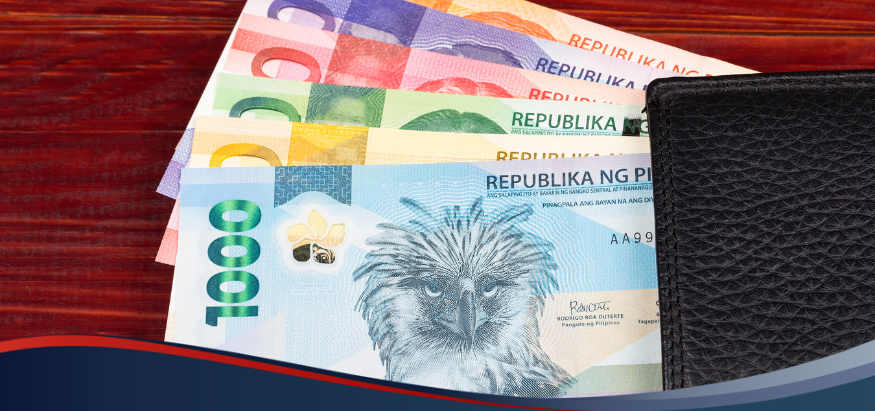 A photo of Peso bills from a wallet, depicting bank transfer to Cebuana transactions